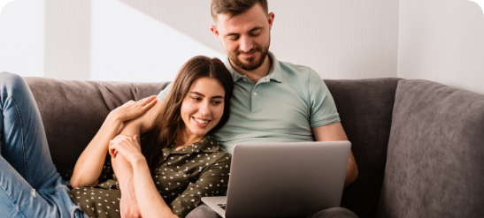man-and-woman-sitting-on-sofa
