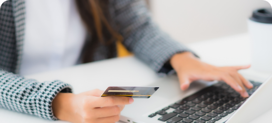 portrait-beautiful-young-asian-woman-use-credit-card-with-laptop-for-online-shopping